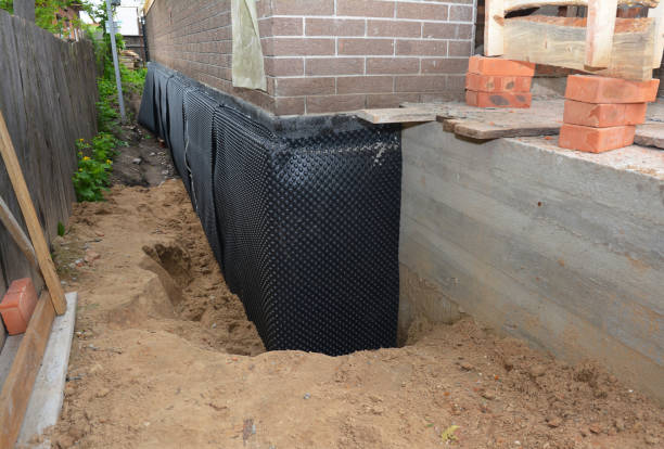 Happy homeowners after waterproofing job in Island Heights